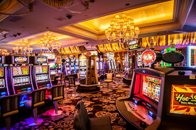 Slot machines neon casino floor